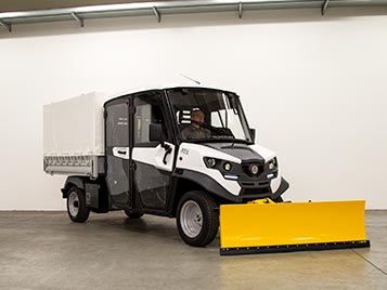 Vehicles with snow blade