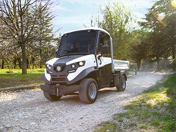 Small pickup on dirt road